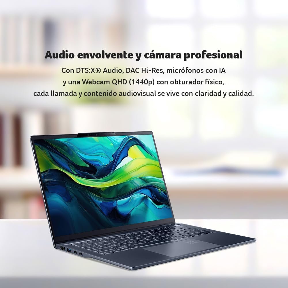 Laptop con audio y cámara profesional Laptop abierta sobre escritorio mostrando pantalla con fondo abstracto y texto descriptivo sobre funciones.