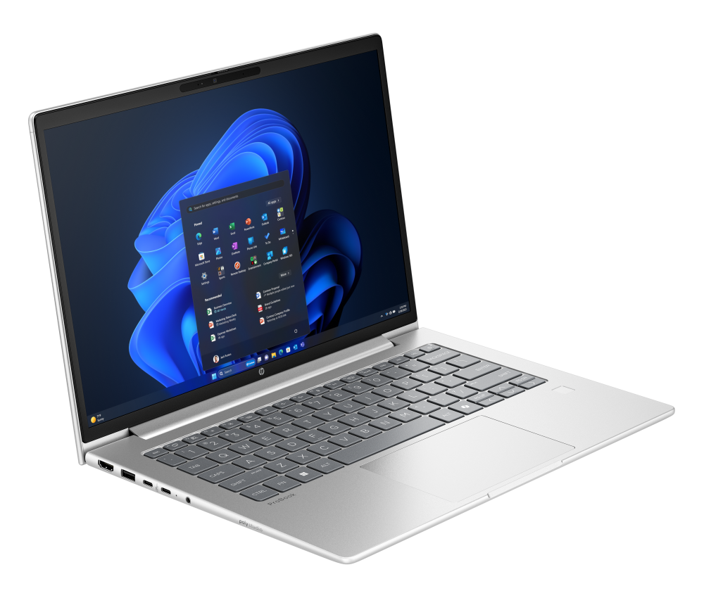Detalle teclado y pantalla Vista isométrica de notebook con teclado retroiluminado y pantalla encendida