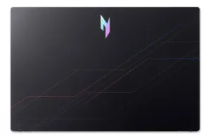 Tapa superior de la computadora con diseño geométrico y logotipo iluminado